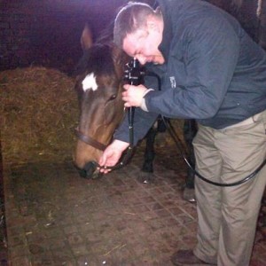 My colleague examining Jerry's trachea with the scope.
